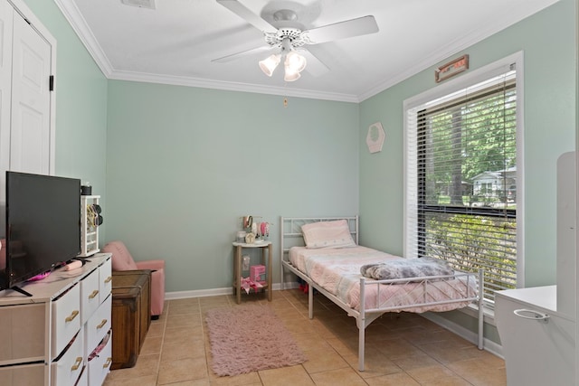 920 Richardson Dr, Jasper, TX 75951 - bedroom featuring crown molding, light tile patterned floors, a ceiling fan, and baseboards