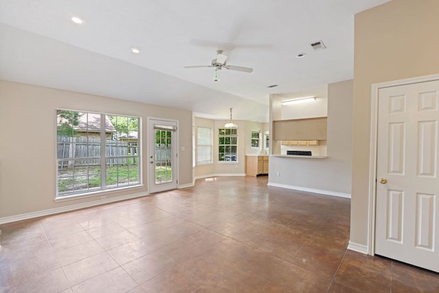 19 Windsor Ct, Lufkin, TX 75901 - unfurnished living room featuring a ceiling fan, dark tile patterned floors, recessed lighting, and lofted ceiling