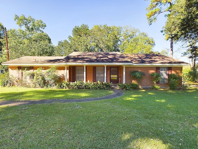 ranch-style home with a front yard