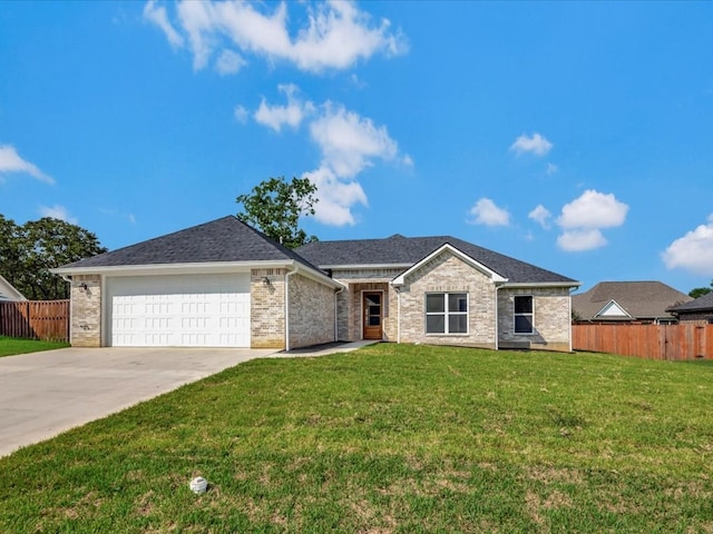 ranch-style house with a front lawn and a garage