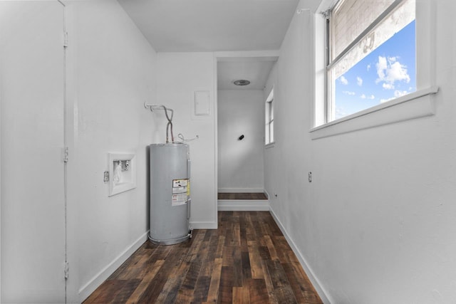 utility room featuring water heater