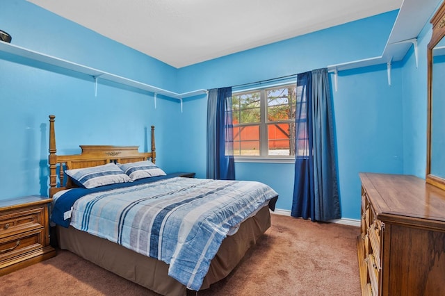 bedroom with light carpet