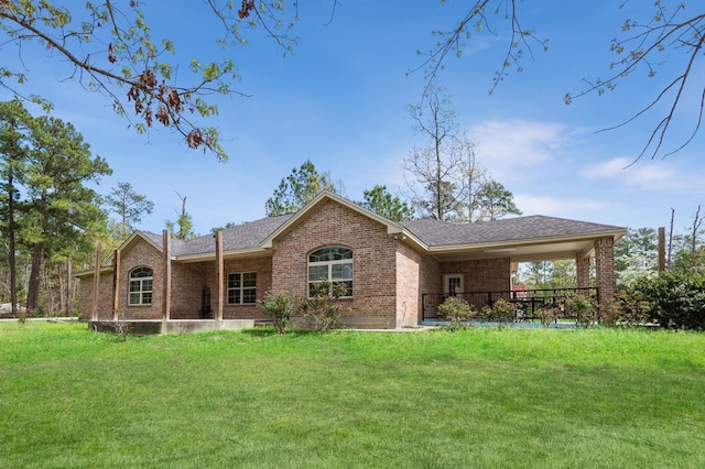 back of house with a yard