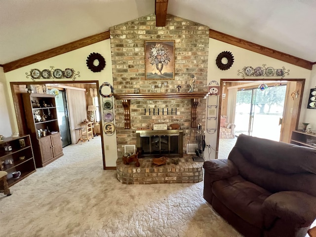 carpeted living room with lofted ceiling with beams and a fireplace