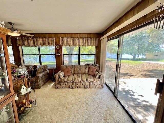 sunroom / solarium with ceiling fan