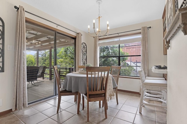 217 County Road 223, Brookeland, TX 75931 - dining space with a chandelier and light tile patterned floors
