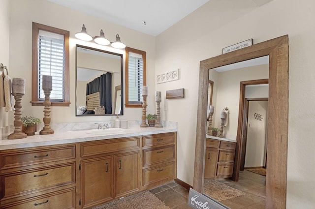 bathroom featuring tile patterned floors and vanity