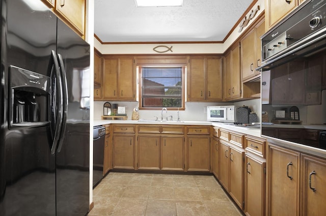 217 County Road 223, Brookeland, TX 75931 - kitchen featuring refrigerator with ice dispenser, brown cabinets, white microwave, black dishwasher, and crown molding