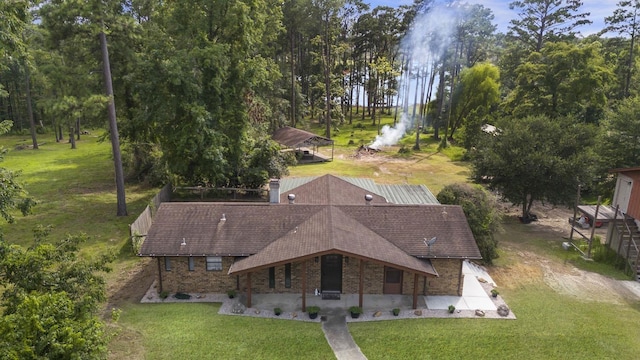 217 County Road 223, Brookeland, TX 75931 - view from above of property with a tree filled landscape