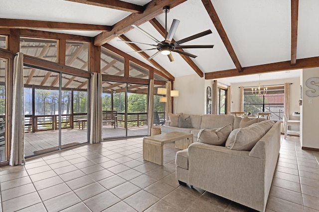 217 County Road 223, Brookeland, TX 75931 - tiled living room with ceiling fan, beam ceiling, high vaulted ceiling, and a chandelier