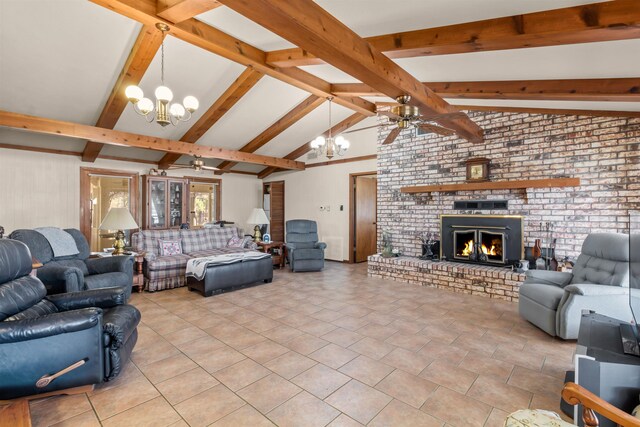 tiled living room featuring lofted ceiling with beams, a fireplace, and ceiling fan with notable chandelier