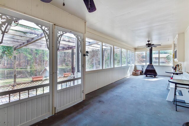 sunroom / solarium with ceiling fan