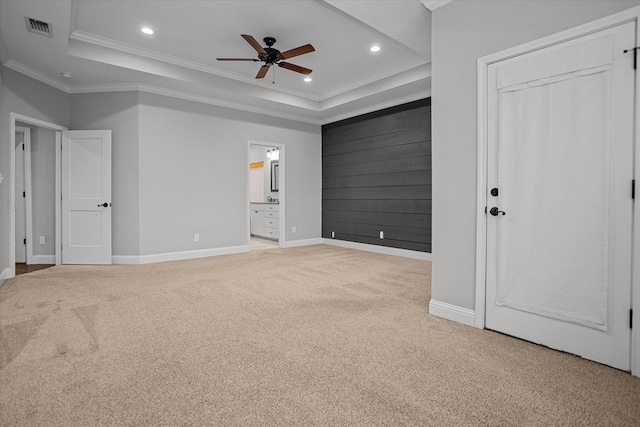 305 Acorn Dr, Lufkin, TX 75904 - unfurnished bedroom with carpet, a raised ceiling, baseboards, recessed lighting, and ornamental molding