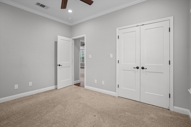 305 Acorn Dr, Lufkin, TX 75904 - unfurnished bedroom with carpet, ornamental molding, baseboards, a closet, and recessed lighting