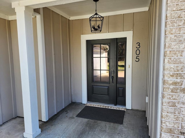 305 Acorn Dr, Lufkin, TX 75904 - property entrance with board and batten siding