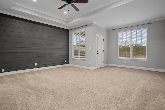 305 Acorn Dr, Lufkin, TX 75904 - carpeted spare room featuring crown molding, ceiling fan, baseboards, recessed lighting, and a tray ceiling