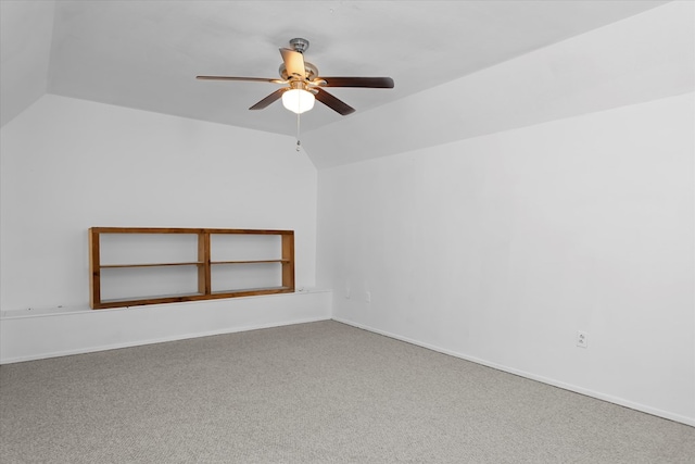 bonus room with carpet floors, vaulted ceiling, and ceiling fan