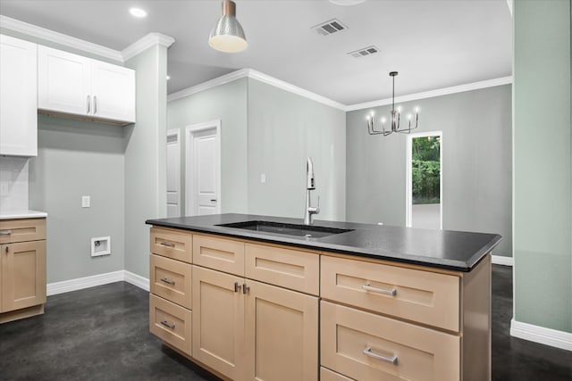 kitchen featuring pendant lighting, light brown cabinets, crown molding, sink, and a notable chandelier