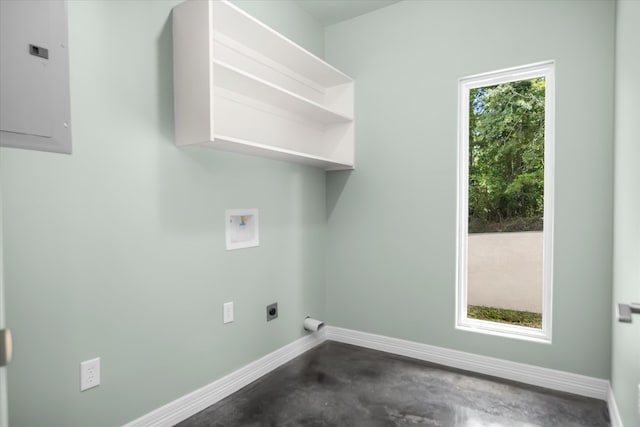 clothes washing area with hookup for an electric dryer, washer hookup, and electric panel