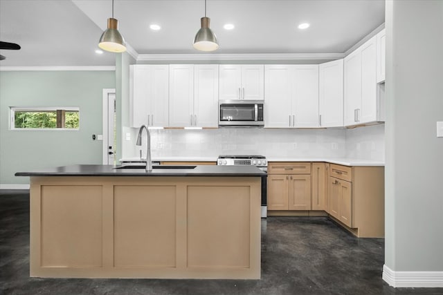 kitchen with stove, white cabinets, sink, ornamental molding, and decorative light fixtures