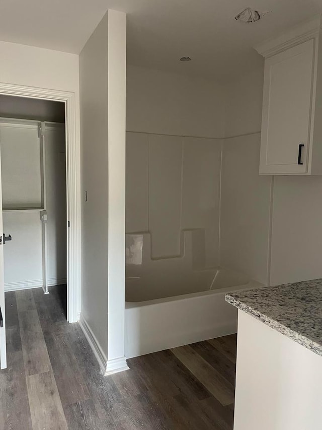 bathroom featuring hardwood / wood-style flooring