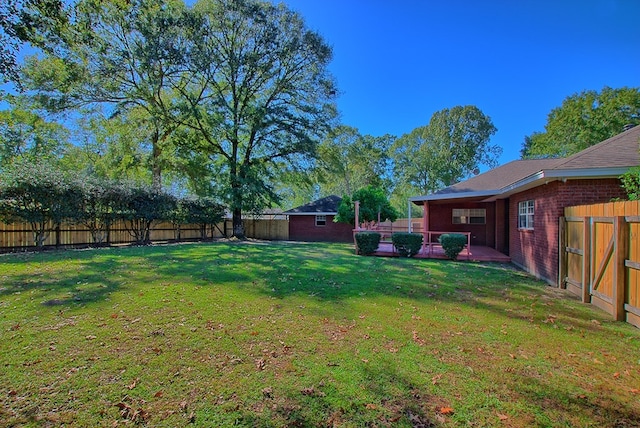 view of yard with a patio area and a shed