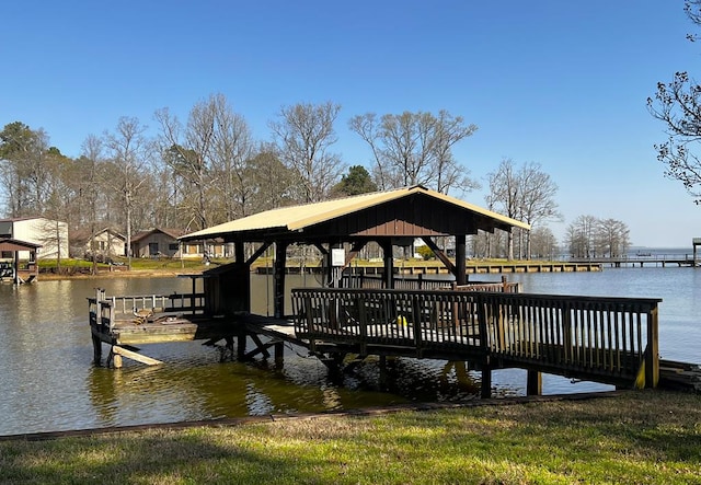 dock area featuring a water view