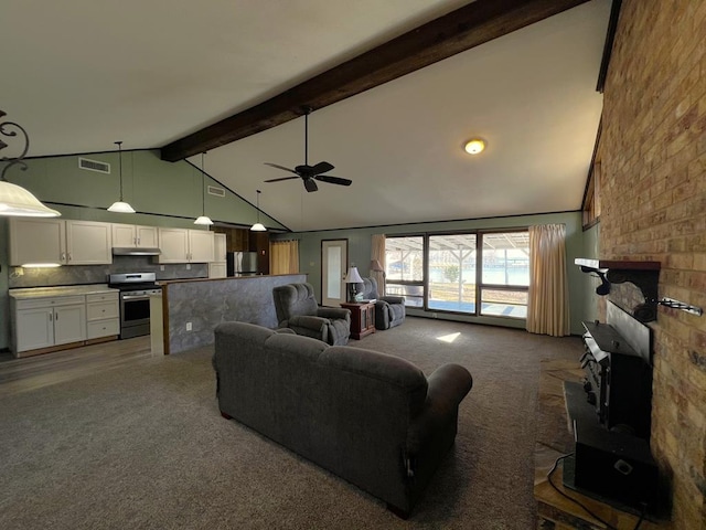 living area featuring visible vents, ceiling fan, carpet, beamed ceiling, and high vaulted ceiling
