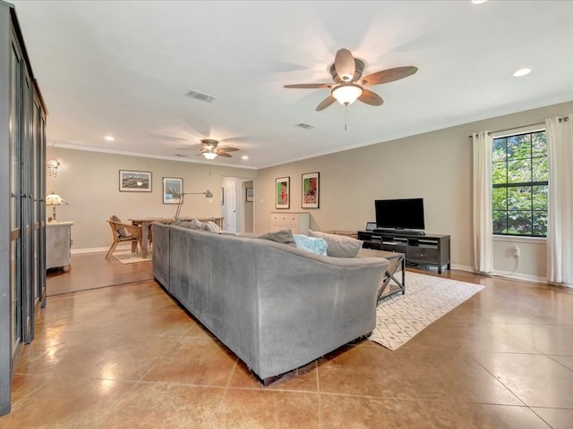 1318 Sue Dr, Lufkin, TX 75901 - living area featuring a ceiling fan, light tile patterned flooring, ornamental molding, and recessed lighting