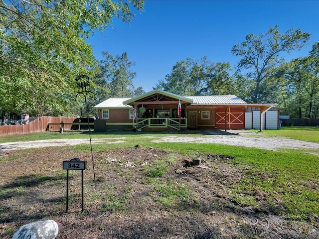 ranch-style house with covered porch