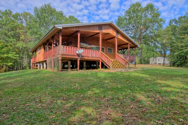 360 Oak Hill Rd, Hemphill, TX 75951 - rear view of property featuring a yard