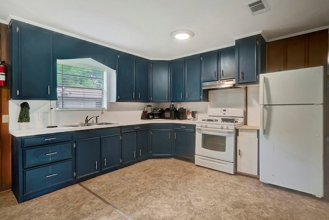 kitchen with blue cabinetry, white appliances, and sink