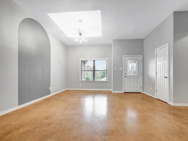 foyer featuring a notable chandelier