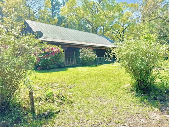 179 County Road 4587, Spurger, TX 77660 - view of green lawn