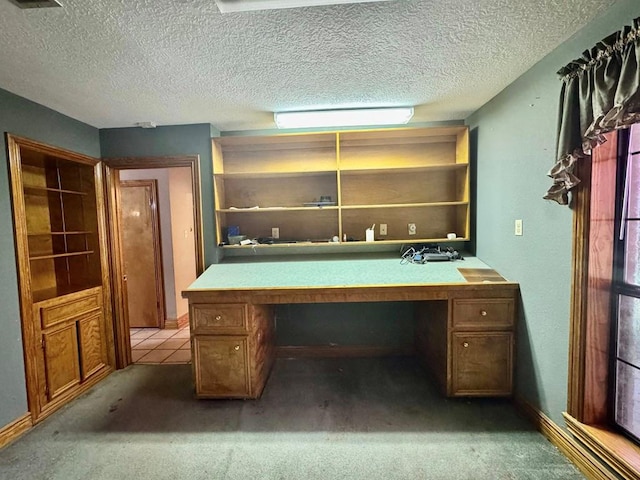 179 County Road 4587, Spurger, TX 77660 - unfurnished office with a textured ceiling and light carpet