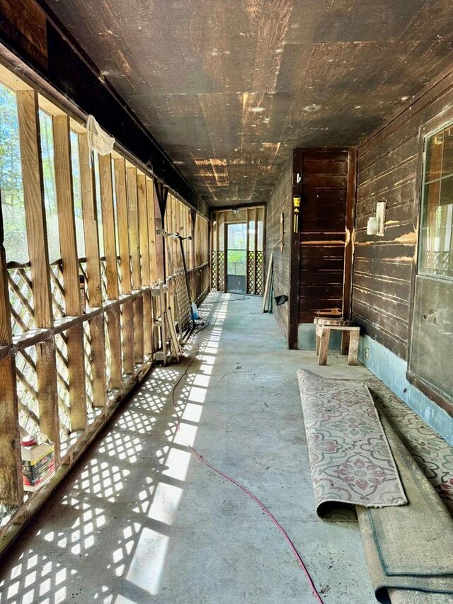 179 County Road 4587, Spurger, TX 77660 - miscellaneous room with unfinished concrete flooring