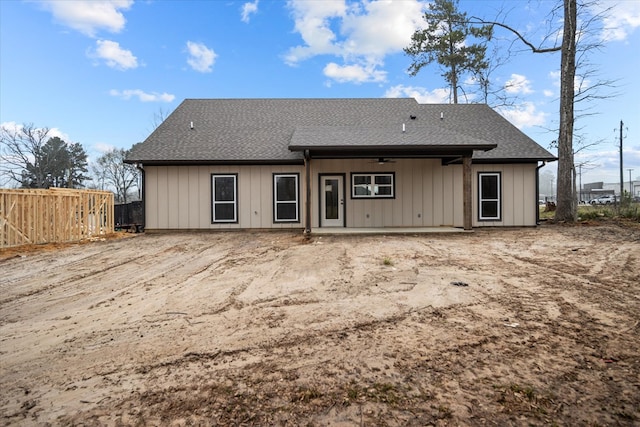 back of house with a patio, roof with shingles, ceiling fan, and fence