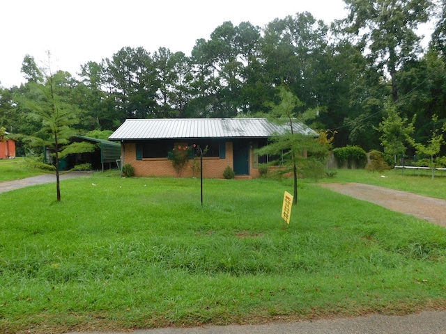 view of community with a yard