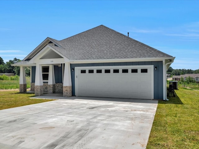 128 Stoney Rdg, Lufkin, TX 75904 - view of front of house featuring a shingled roof, concrete driveway, and a front lawn