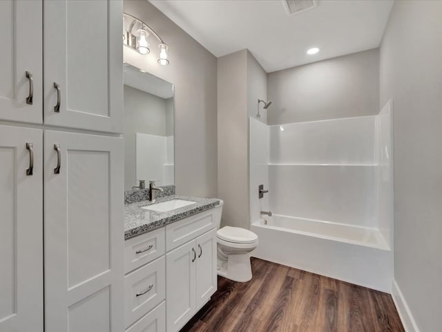 128 Stoney Rdg, Lufkin, TX 75904 - bathroom with vanity, shower / bath combination, and wood finished floors