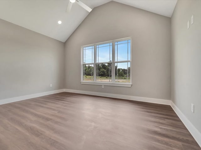 128 Stoney Rdg, Lufkin, TX 75904 - empty room with lofted ceiling, ceiling fan, wood finished floors, and recessed lighting