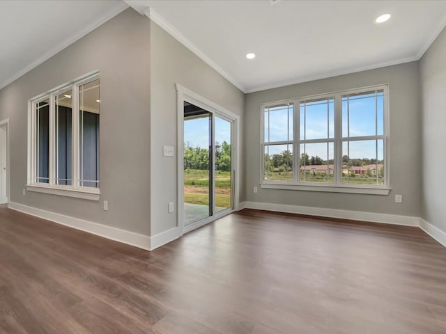 128 Stoney Rdg, Lufkin, TX 75904 - spare room featuring dark wood-style floors, crown molding, and recessed lighting