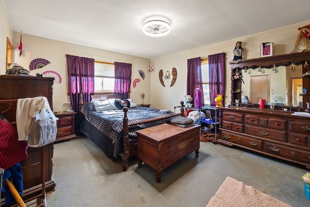 bedroom with light colored carpet