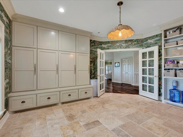 5078 US Highway 21, Nacogdoches, TX 75964 - mudroom with french doors, ornamental molding, wallpapered walls, and stone tile floors
