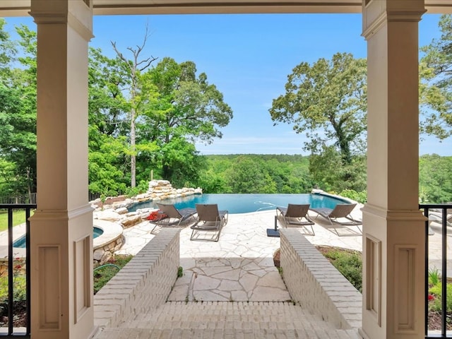 5078 US Highway 21, Nacogdoches, TX 75964 - view of patio / terrace with an infinity pool
