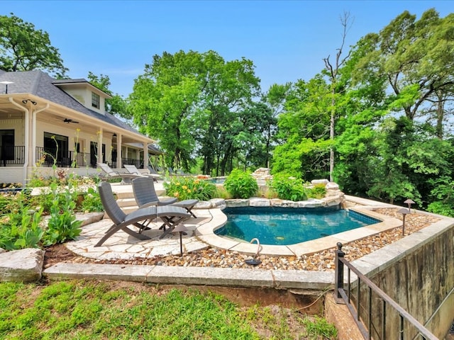 5078 US Highway 21, Nacogdoches, TX 75964 - swimming pool featuring a patio and a ceiling fan