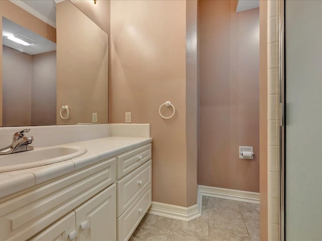 5078 US Highway 21, Nacogdoches, TX 75964 - bathroom with vanity, baseboards, tile patterned flooring, ornamental molding, and a shower with door