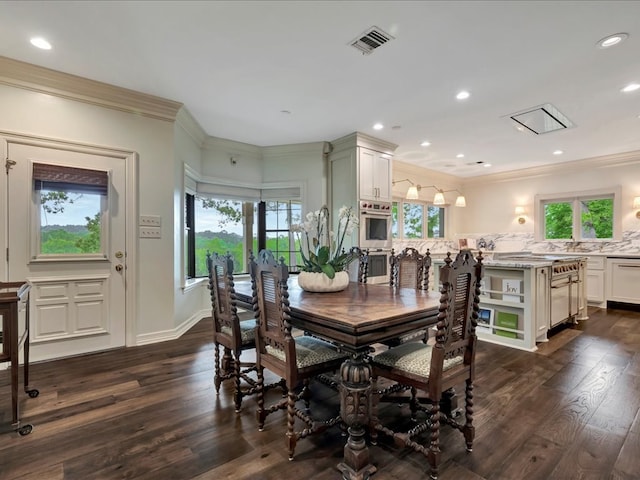 5078 US Highway 21, Nacogdoches, TX 75964 - dining space with dark wood-style floors, ornamental molding, and recessed lighting