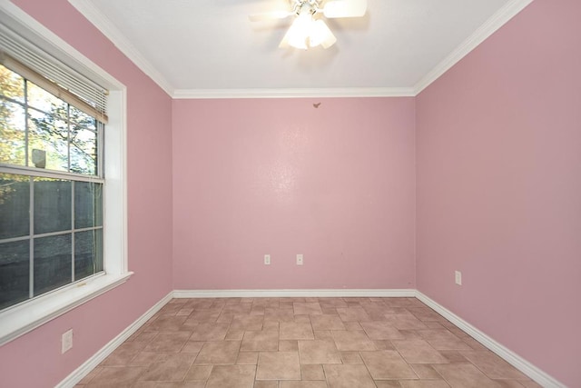 empty room featuring ceiling fan and crown molding