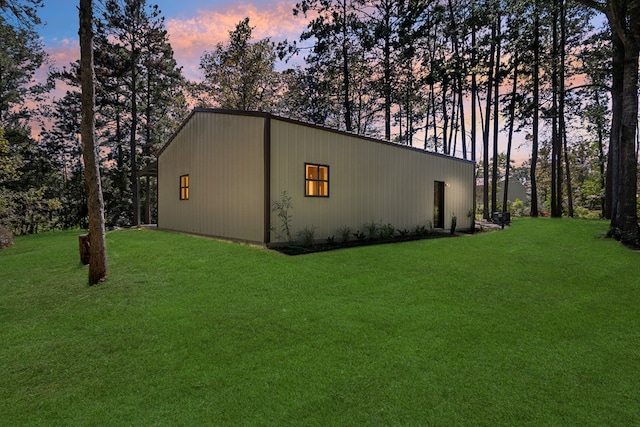 131 Oak Ln, Hemphill, TX 75948 - property exterior at dusk featuring a yard